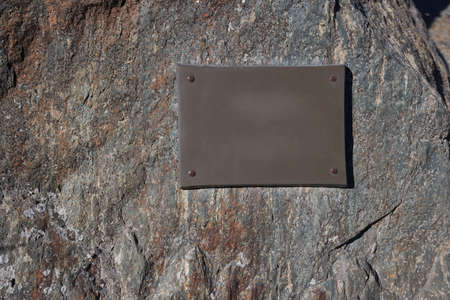 Memorial plate or information sign on cliff surfaceの写真素材