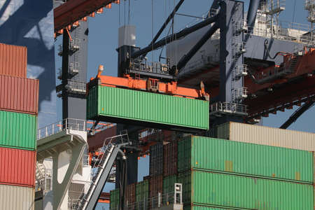 Loading containers on a shipの写真素材