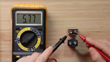 9 volt battery cell voltage checkingの写真素材