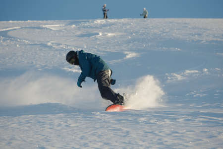 Snowboarding in fresh powder snowのeditorial素材