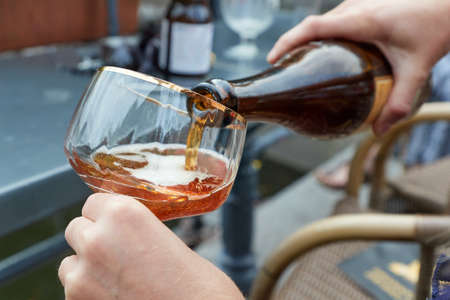 Beer poured in a glass in The Netherlandsの写真素材