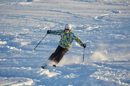 Freeride skier doing hand stand on the peakのeditorial素材