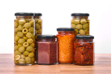 Olives , pesto, dried tomatoesの写真素材