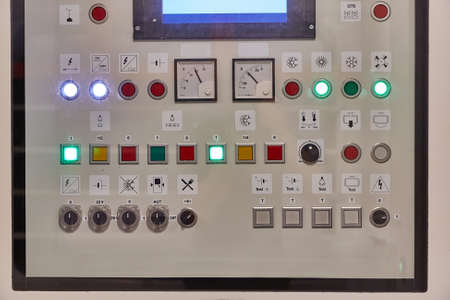 Buttons of a control panel in a train wagonの写真素材