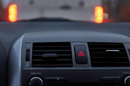 Dashboard hazard light button in stopping trafficの写真素材