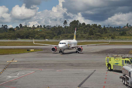 Airplne arriving at the airportのeditorial素材