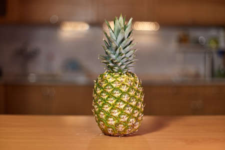 Pineapple on the kitchen counterの写真素材
