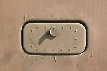 Military vehicl detail fuel tank lid rusty metalの写真素材