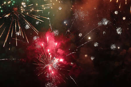 Fireworks against dark skyの写真素材