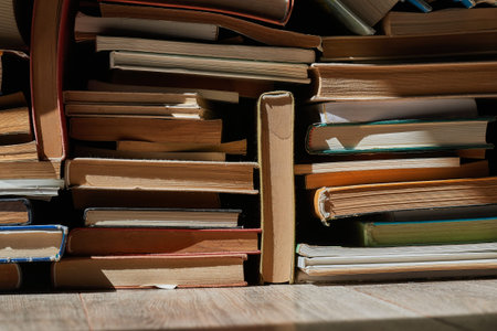 Wall of books piled upの写真素材