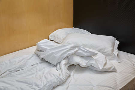Hotel bed closeupの写真素材