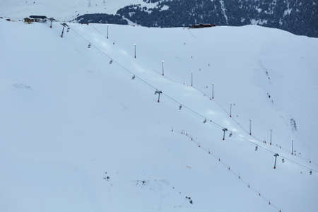 Skiing slopes illuminated for dusk skiingの写真素材