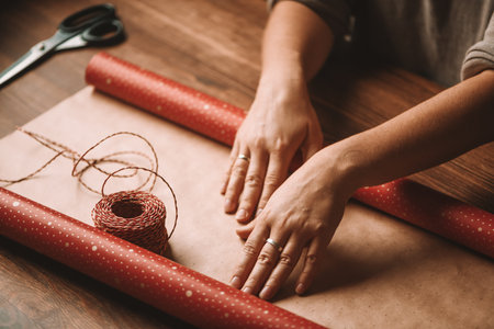Packaging of new years gifts, preparation for the new year. Christmas mood. New year 2021