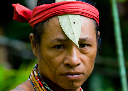 MENTAWAI PEOPLE, WEST SUMATRA, SIBERUT ISLAND, INDONESIA - 16 NOVEMBER 2010: Portrait of a man...