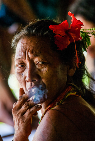 MENTAWAI PEOPLE, WEST SUMATRA, SIBERUT ISLAND, INDONESIA - 16 NOVEMBER 2010: Portrait of an old woman Mentawai tribe. Close-up.のeditorial素材