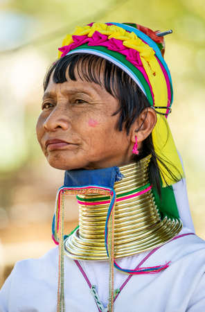 Portrait of an old Padaung woman in traditional dress and with metal rings around her neck. February 12, 2019, Myanmar.のeditorial素材