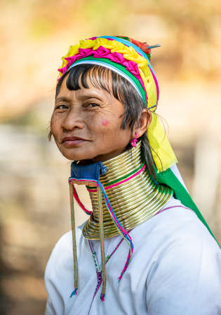 Portrait of an old Padaung woman in traditional dress and with metal rings around her neck. February 12, 2019, Myanmar.のeditorial素材
