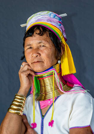 Portrait of an old Padaung woman in traditional dress and with metal rings around her neck. February 12, 2019, Myanmar.のeditorial素材