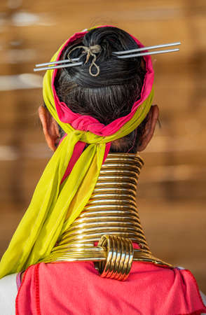 Elements of traditional female jewelry of the Padaung people (rings on the neck and bracelets on the hands). February 12, 2019, Myanmar.のeditorial素材