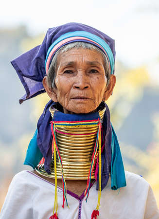 Portrait of an old Padaung woman in traditional dress and with metal rings around her neck. February 12, 2019, Myanmar.のeditorial素材