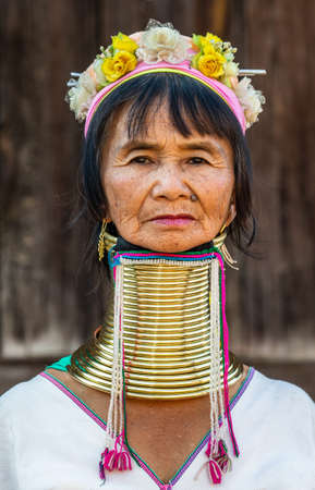 Portrait of an old Padaung woman in traditional dress and with metal rings around her neck. February 12, 2019, Myanmar.のeditorial素材