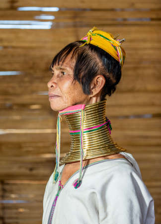 Portrait of an old Padaung woman in traditional dress and with metal rings around her neck. February 12, 2019, Myanmar.のeditorial素材