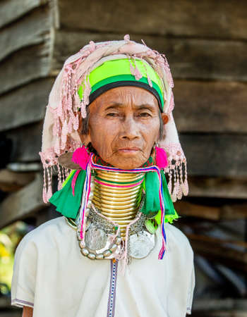 Portrait of an old Padaung woman in traditional dress and with metal rings around her neck. February 12, 2019, Myanmar.のeditorial素材