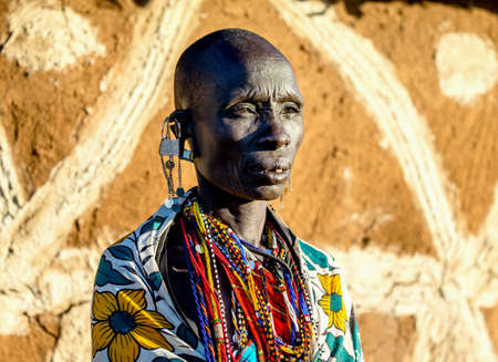 Portrait of an old Masai tribe woman in traditional clothes. Close-up. Tanzania, East Africa, August 12, 2018.のeditorial素材
