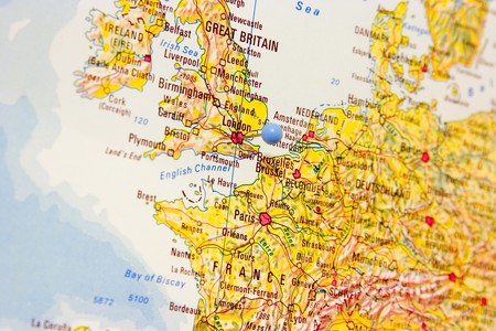 Detail of map with London in focus and marked by a map pinの写真素材