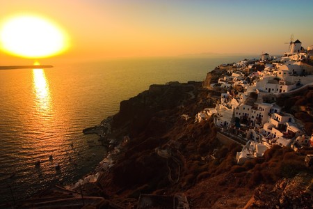Dramatic sunset in the village of Oia, Santoriniの写真素材