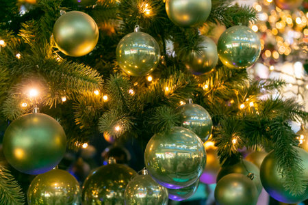 Many different Christmas balls on the Christmas tree. close-up. Festive Christmas toys. Christmas decorations.の写真素材