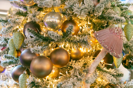 Magic pink mushroom and a lot of Christmas balls on the Christmas tree. close-up. Festive Christmas toys. New Year mood.の写真素材