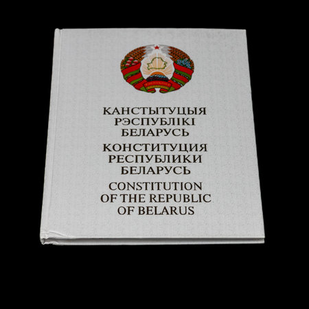 Minsk. Belarus. 10/12/2022. The Constitution of the Republic of Belarus on a black background. Basic...