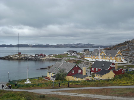 View of the colorful houses of Nuuk on the seashore, Greenland
