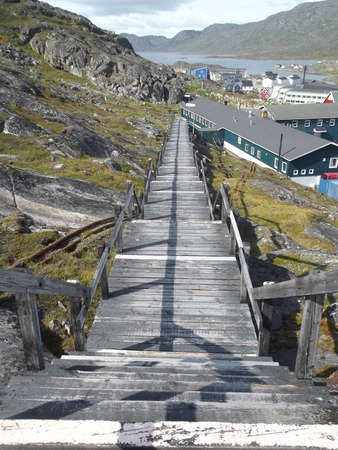 Qaqortog, Iceland is built on many hills, except the roads are stairs everywhere in the cityの写真素材