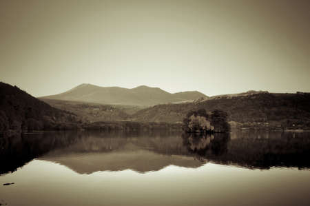 Reflections of Autumnal Colors on the Lake of Chambonの写真素材
