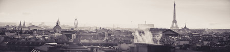 Panoramic View of Paris seen from Rooftops at Sunset