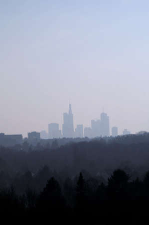 Skyline of Frankfort behind a forestの写真素材