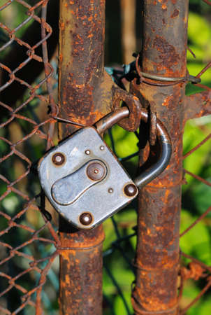 Rusted garden gate Old rusty garden gate with a wire-nettingの写真素材