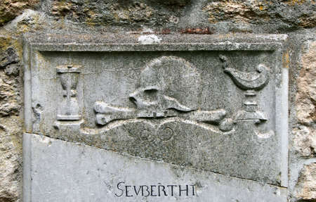 Ancient Gravestone with skullのeditorial素材