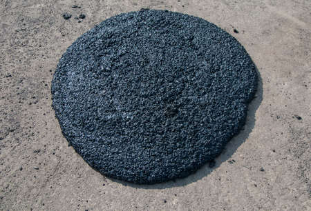 Asphalt recycling broken pieces heapedの写真素材