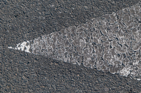 White painted arrow on Old Road