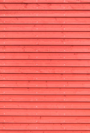 Red painted wooden boards textureの写真素材