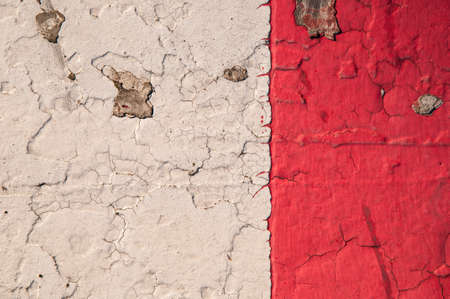 Weathered plaster with decorative structure in red and whiteの写真素材