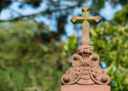 christian cross with ornaments, sandstoneの写真素材