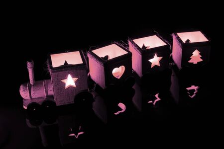 Train of pink lights. Old wooden toyの写真素材