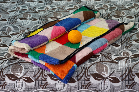 Knitted colorful square beautiful blanket