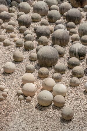 Many size of round rocks on the groundの写真素材