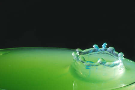 blue make a crown-shaped rippleの写真素材