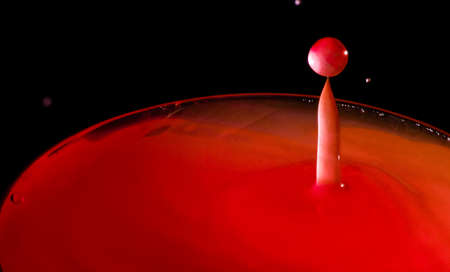 Red water splashの写真素材